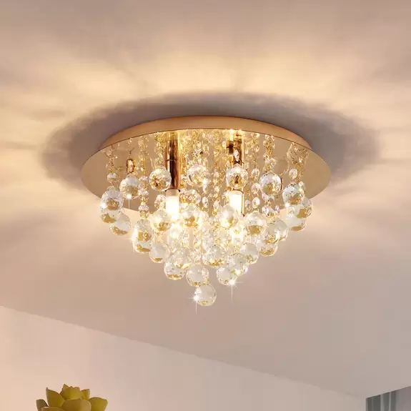 Lampenwelt Lindby Deckenleuchte Gillion, 4-flg., goldfarben, Kristall Riesige Ersparnisse