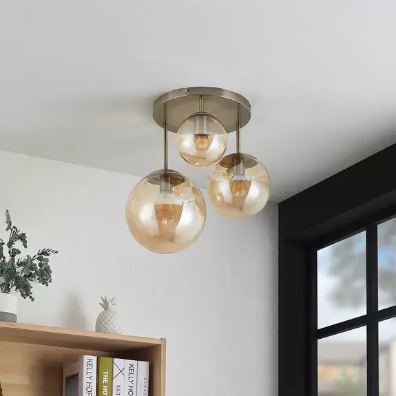 Lampenwelt Lindby Teeja Deckenlampe, 3 Glaskugeln, amber Angebote
