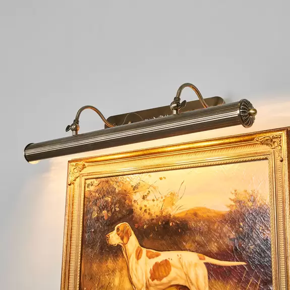 Lampenwelt Längliche Bilderlampe Joely in Altmessing Räumungsverkauf